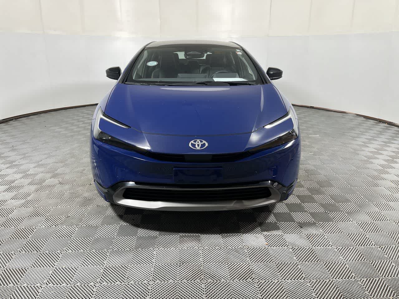 2024 Toyota Prius — rear three-quarter view