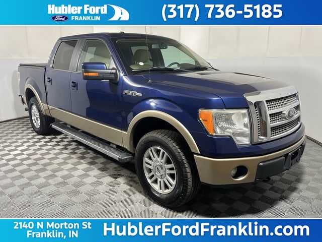 2012 Ford F-150 Lariat in Dark Blue Pearl Metallic/Pale Adobe Metallic — front three-quarter view