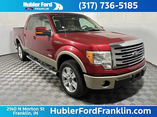 2013 Ford F-150 Lariat in Ruby Red Metallic Tinted Clear Coat/Pale Adobe Met — front three-quarter view