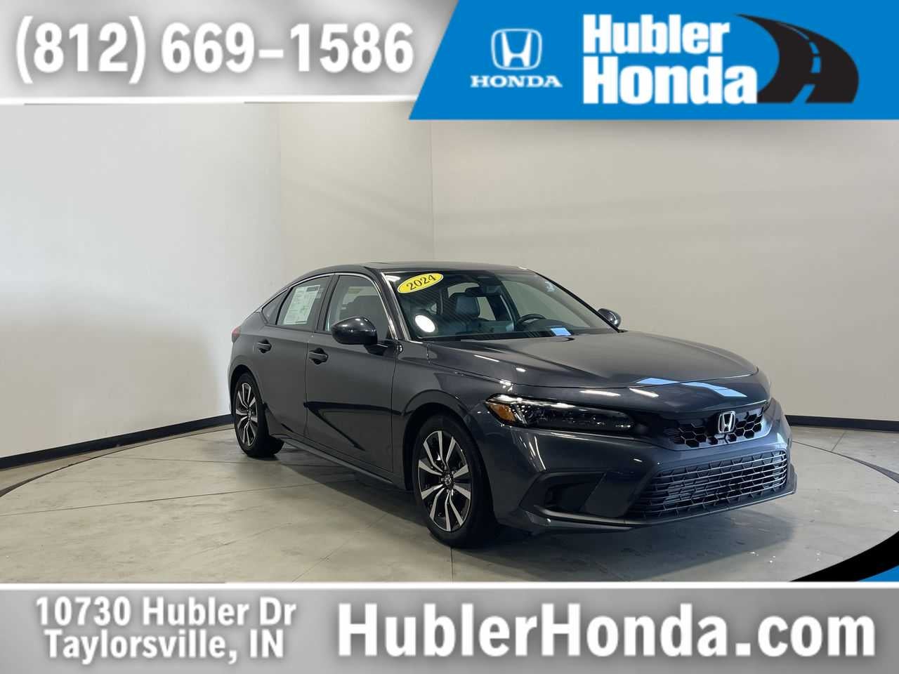 2024 Honda Civic EX-L in Meteorite Gray Metallic — front three-quarter view