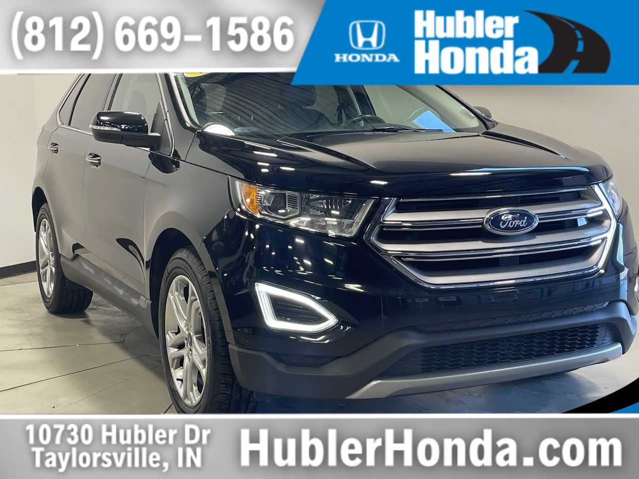 2018 Ford Edge Titanium in Shadow Black — front three-quarter view