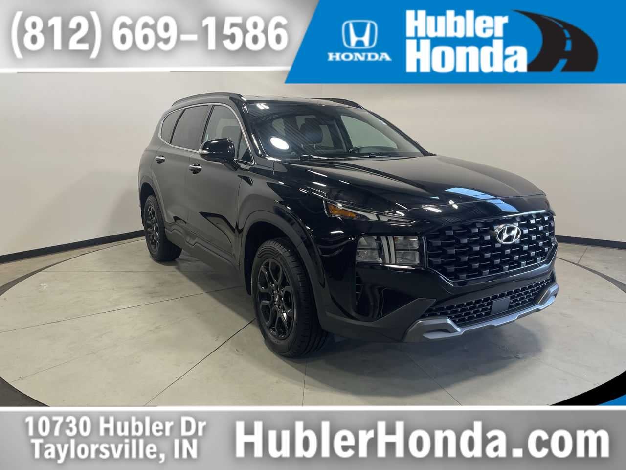 2023 Hyundai Santa Fe XRT in Twilight Black — front three-quarter view