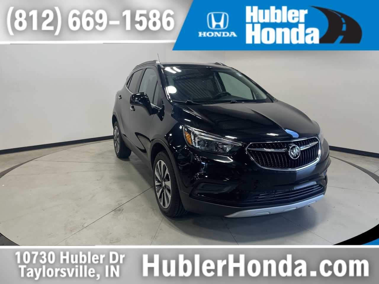 2022 Buick Encore Preferred in Ebony Twilight Metallic — front three-quarter view