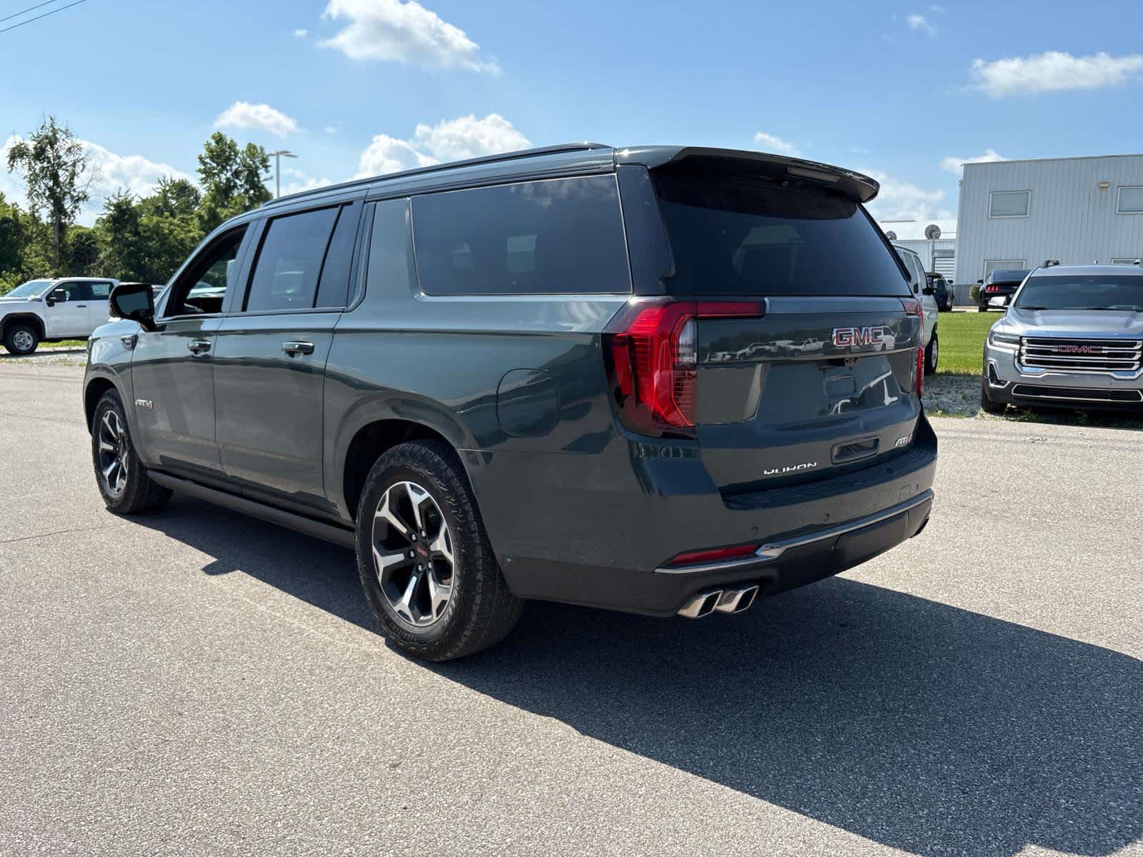 2026 GMC Yukon XL — rear three-quarter view