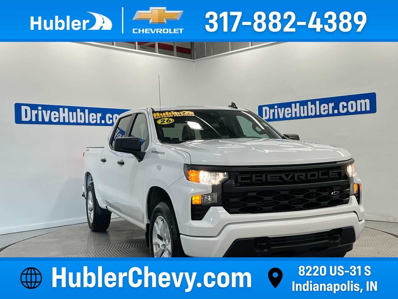 2026 Chevrolet Silverado 1500 Custom in Summit White — front three-quarter view