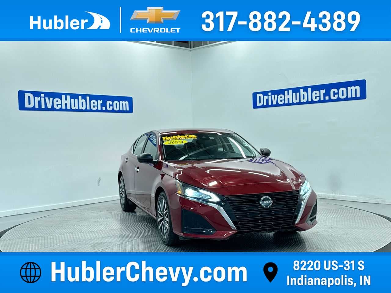 2024 Nissan Altima 2.5 SV in Maroon — front three-quarter view