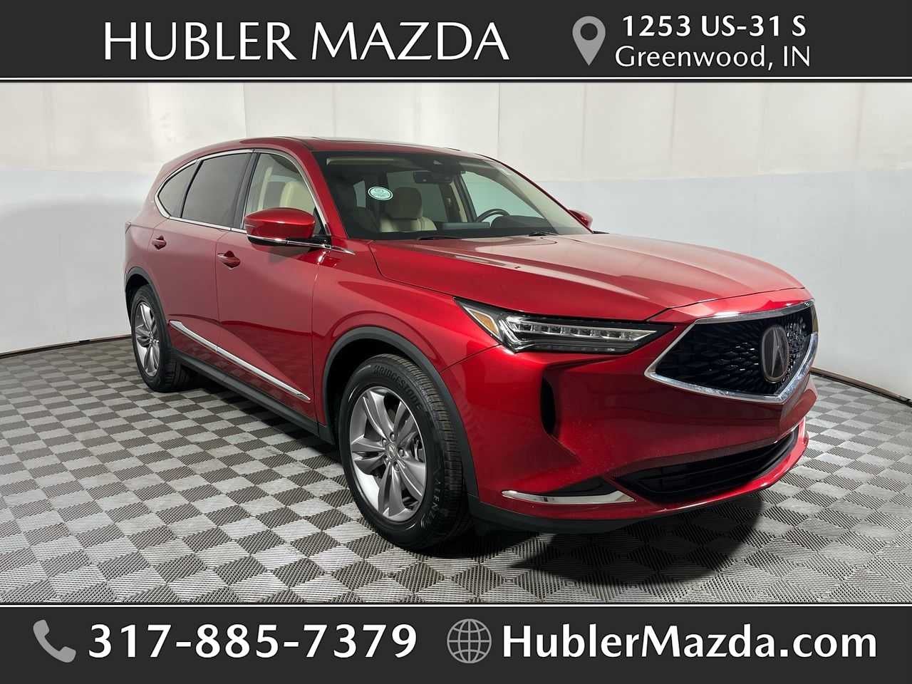 2022 Acura MDX SH-AWD in Performance Red Pearl — front three-quarter view