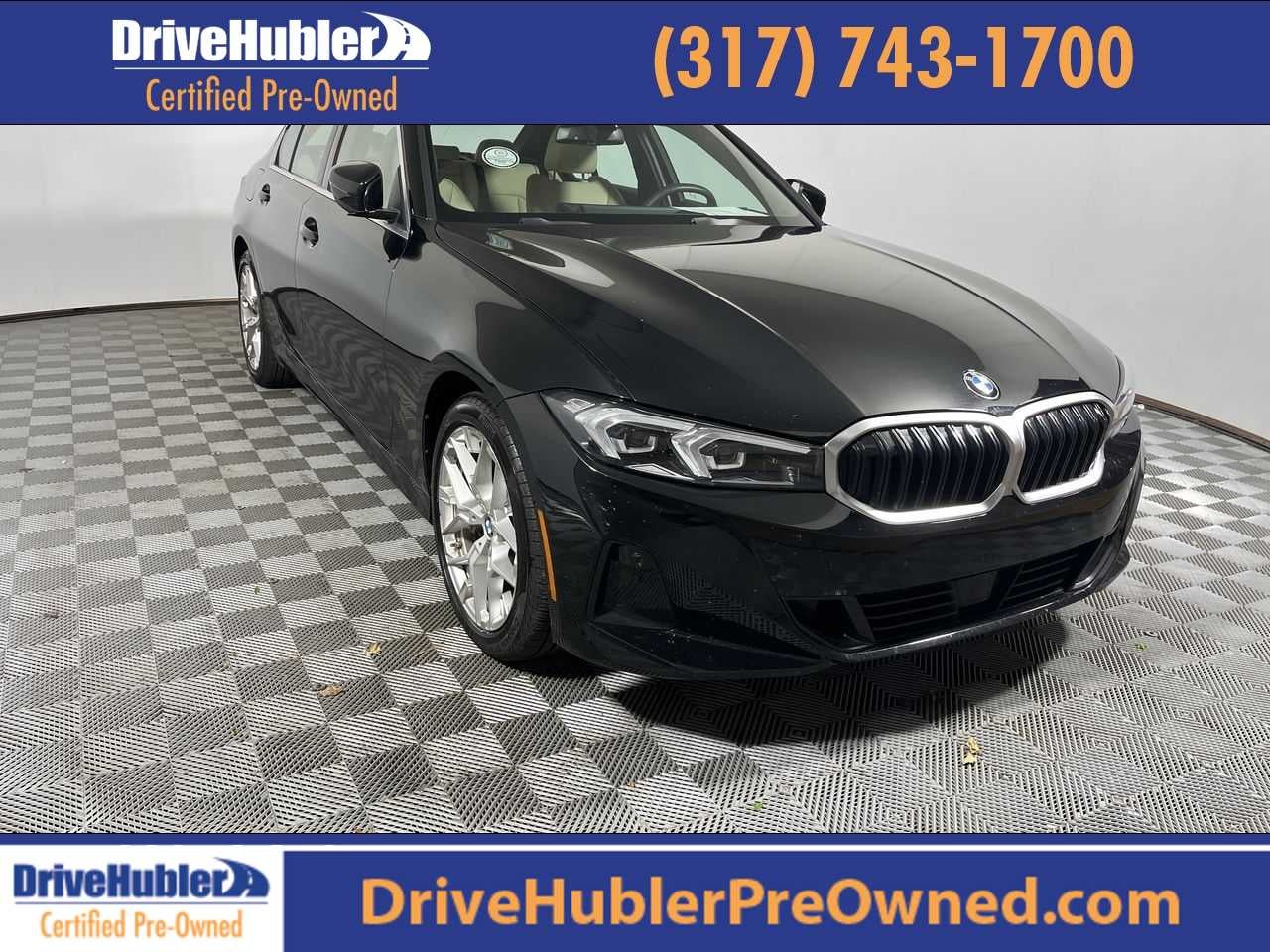 2025 BMW 330i 330i in Jet Black — front three-quarter view