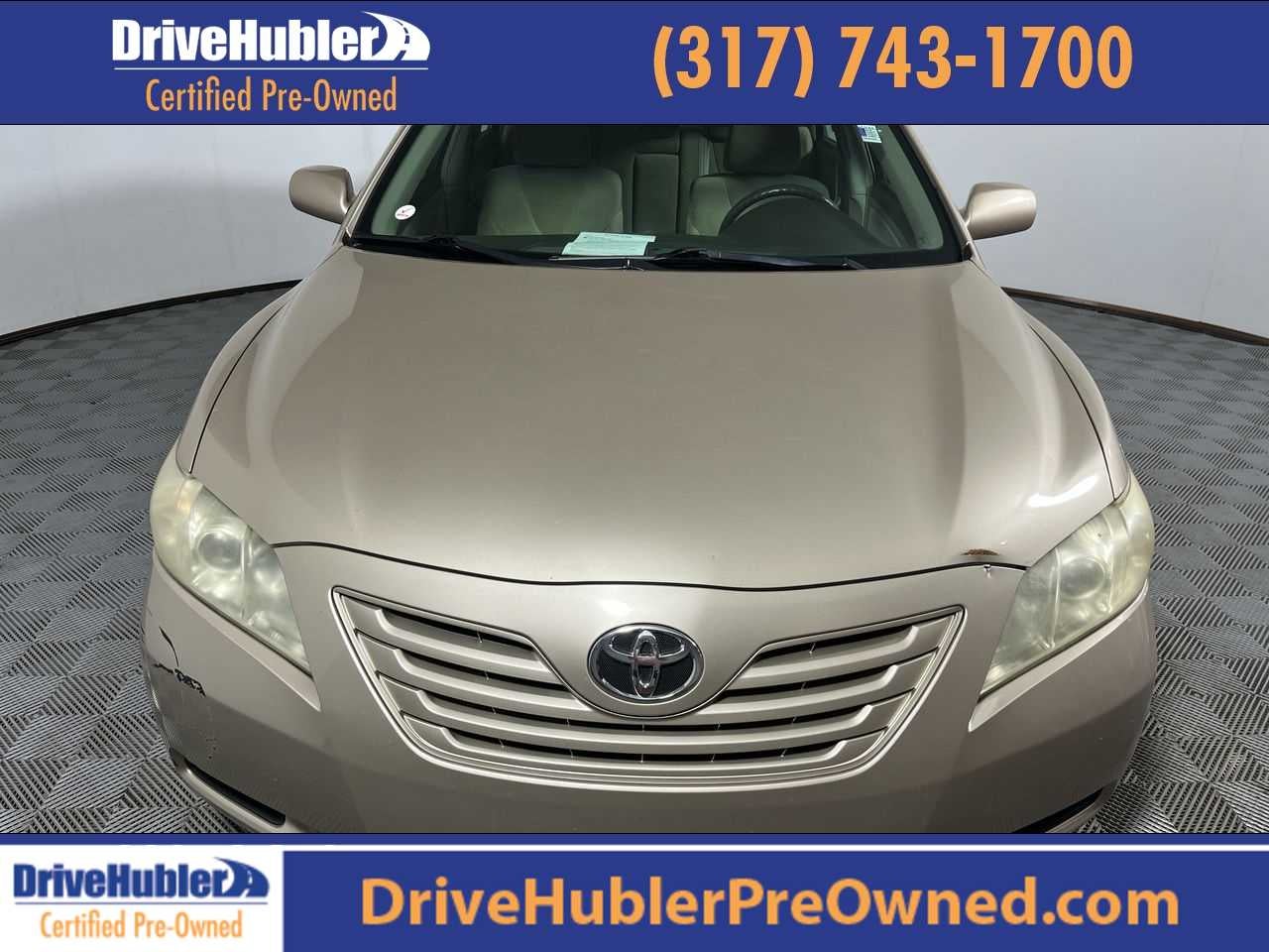 2008 Toyota Camry LE in Desert Sand Metallic — front three-quarter view
