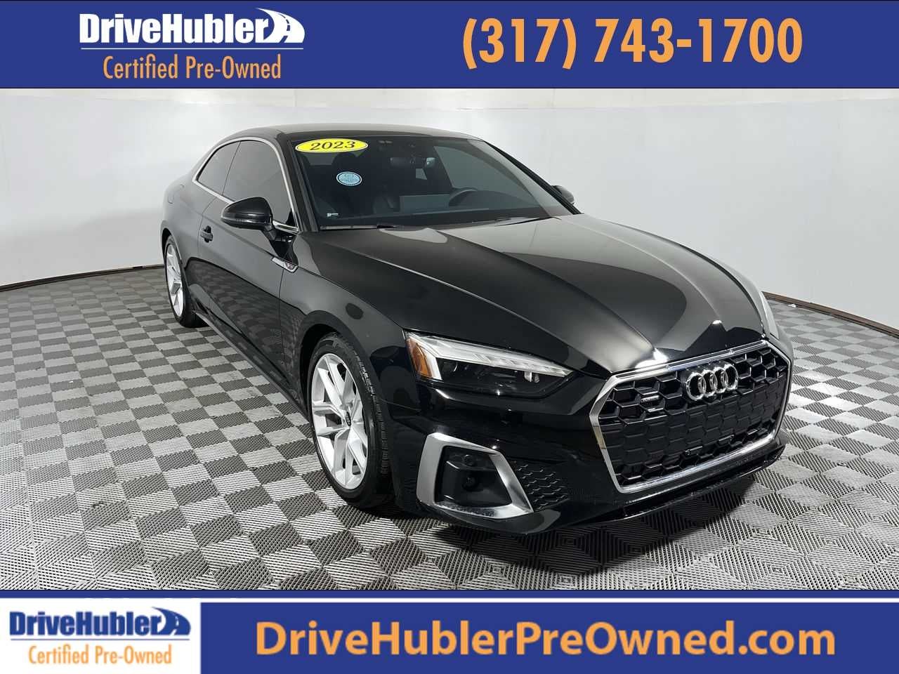 2023 Audi A5 Coupe S line Premium Plus in Mythos Black Metallic — front three-quarter view