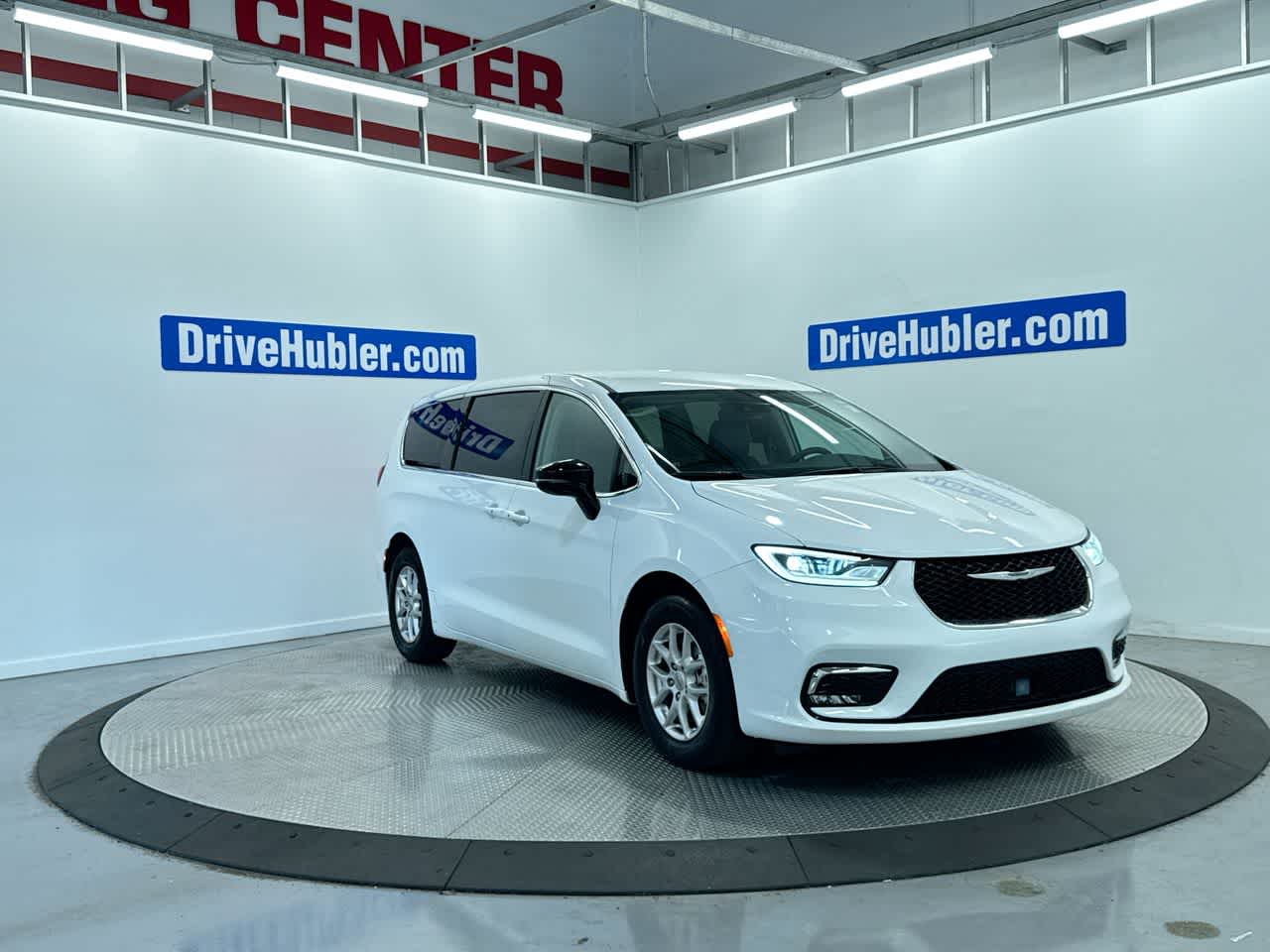2024 Chrysler Pacifica Touring L in Bright White Clearcoat — front three-quarter view