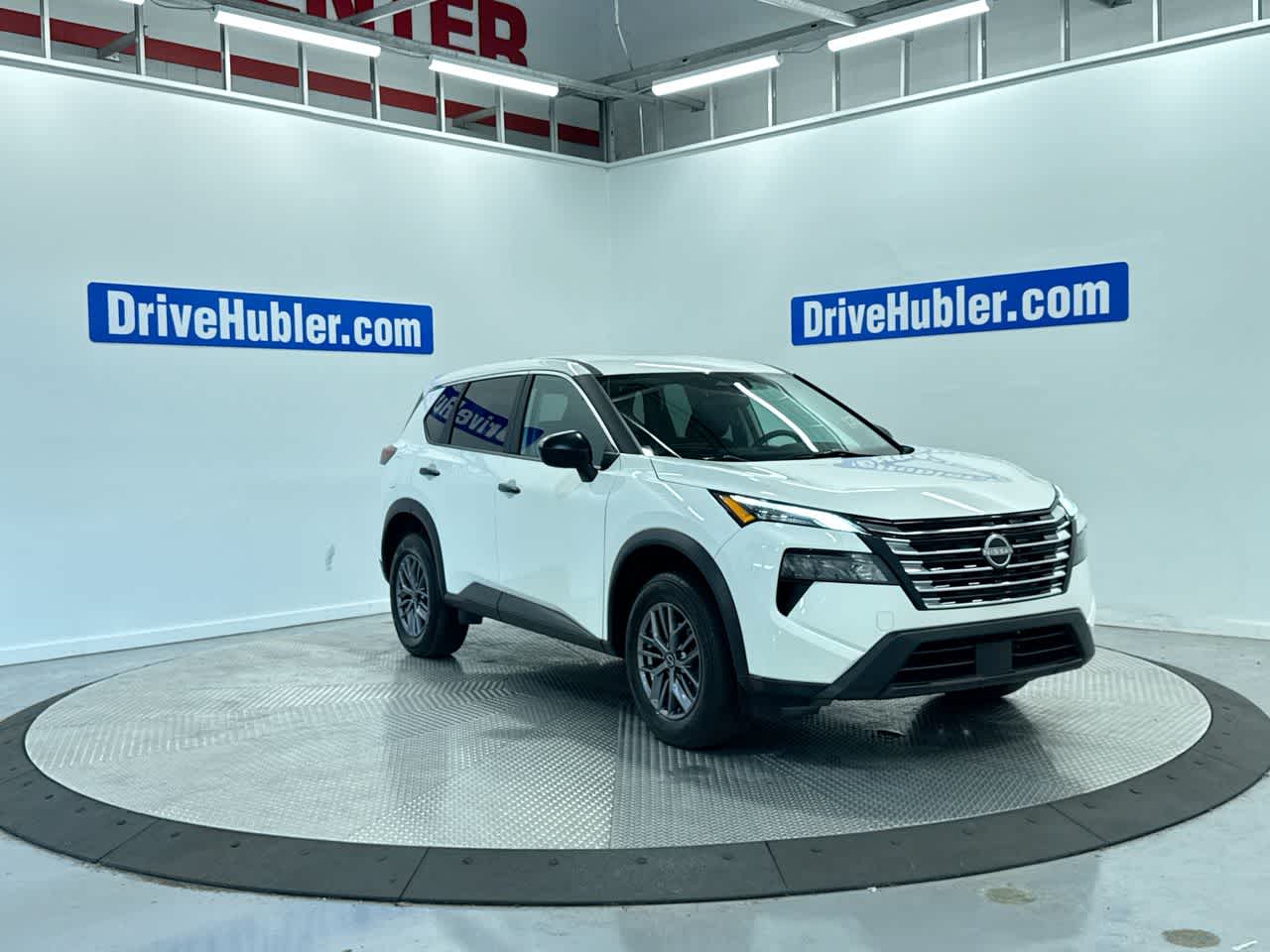 2024 Nissan Rogue S in Glacier White — front three-quarter view