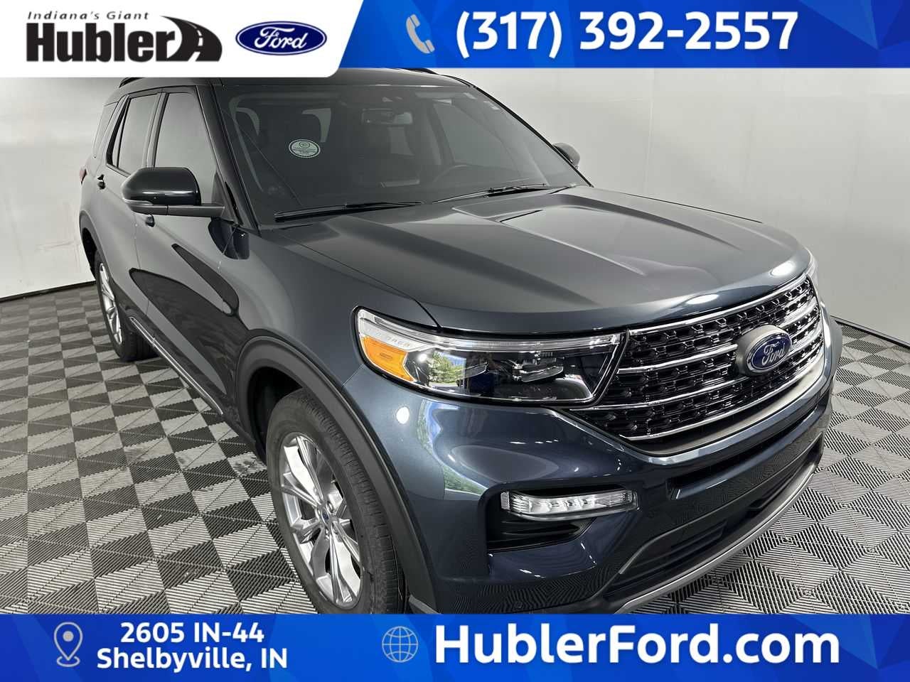 2024 Ford Explorer XLT in Stone Blue Metallic — front three-quarter view