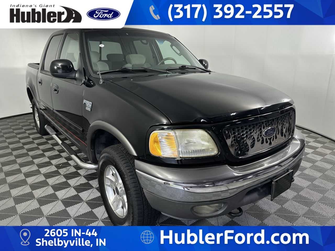 2003 Ford F-150 XLT in Black — front three-quarter view